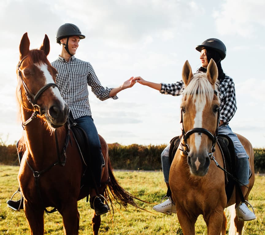couple on a horseback ride