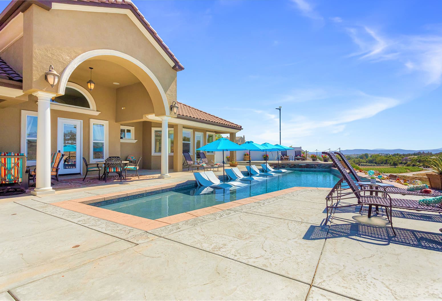 Gaia Inn & Spa pool and lounge chairs